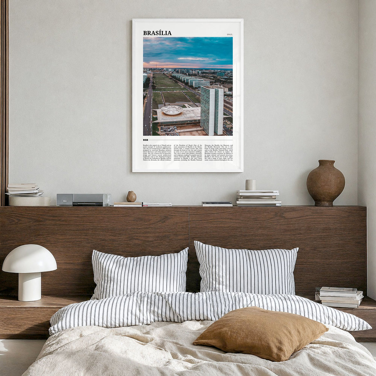 Brasília Travel Poster in a white wood frame, hanging in a bedroom