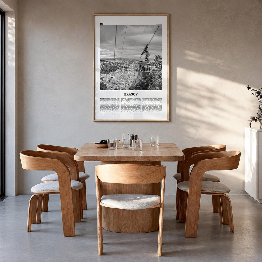 Brașov black & white newspaper poster of Romania – vertical wall art in natural wood frame, hanging on wall