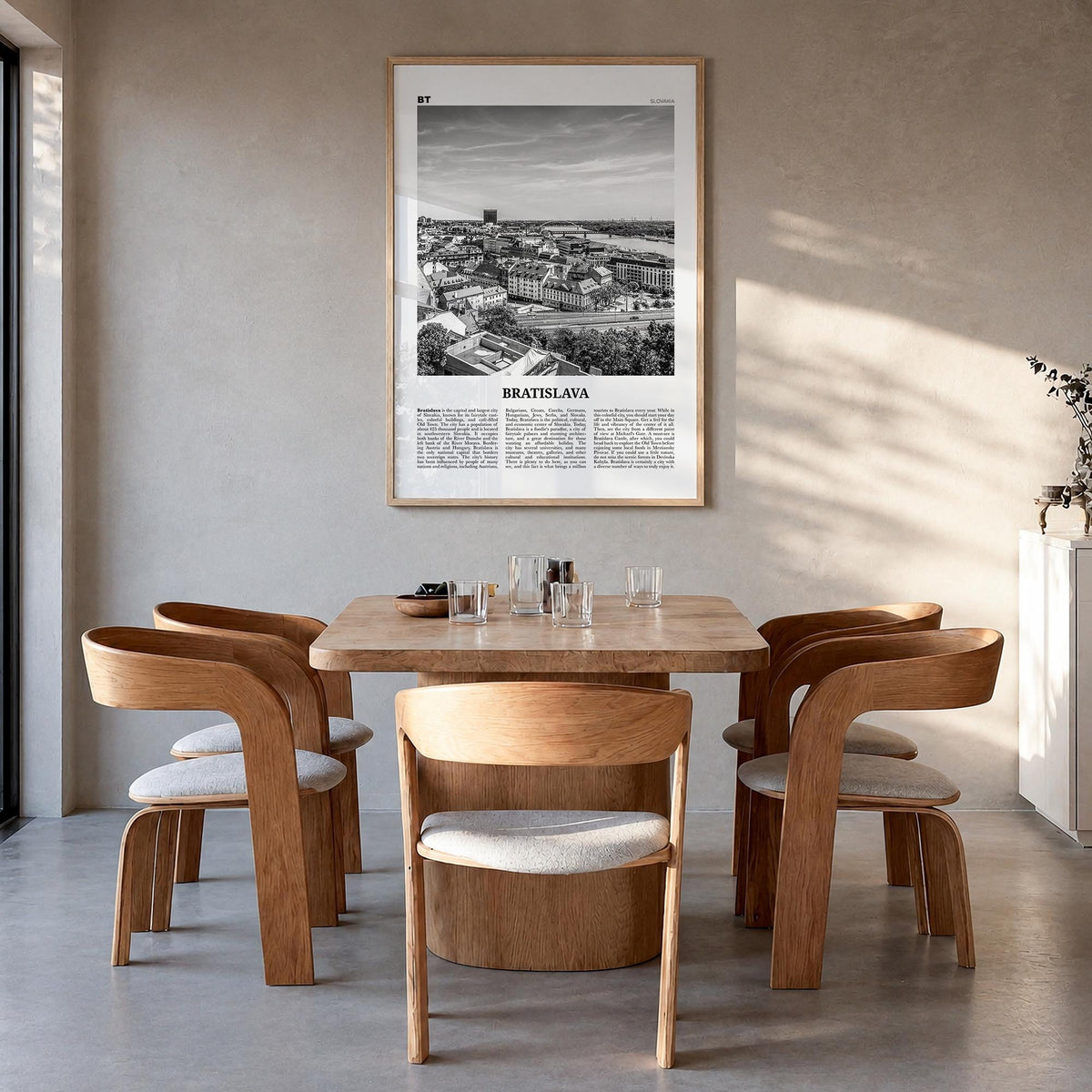 Bratislava black & white newspaper poster of Slovakia – vertical wall art in natural wood frame, hanging on wall