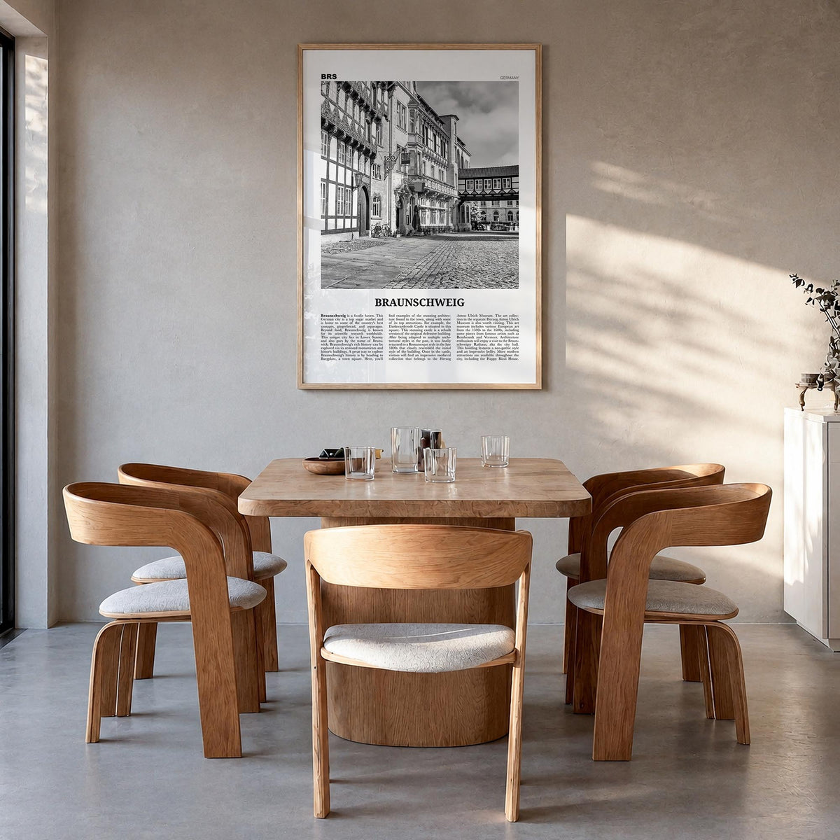Braunschweig black & white newspaper poster of Germany – vertical wall art in natural wood frame, hanging on wall