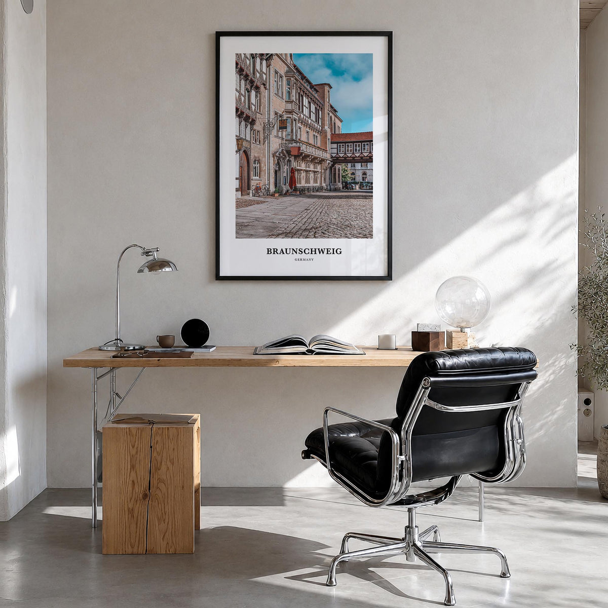 Braunschweig colorful classic poster of Germany – vertical wall art in black wood frame, hanging on wall