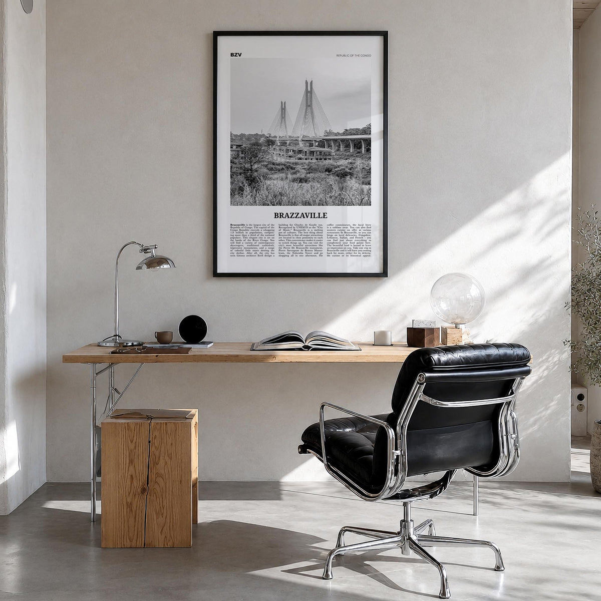 Brazzaville black & white newspaper poster of Republic of the Congo – vertical wall art in black wood frame, hanging on wall