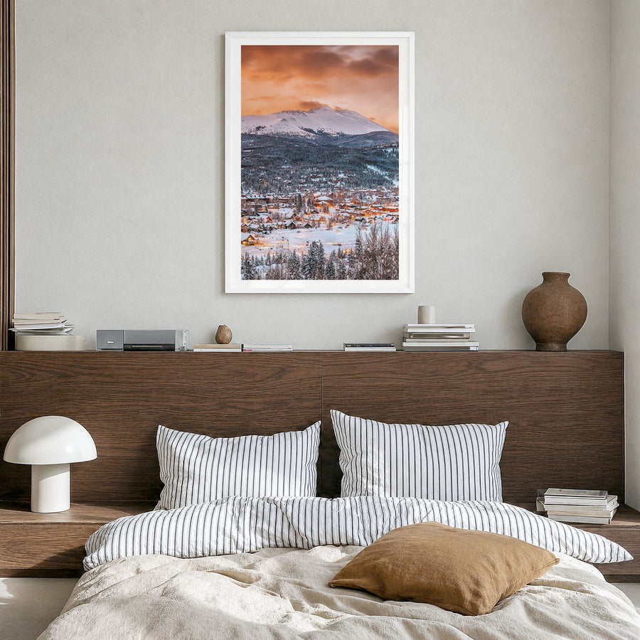 Breckenridge Photo Poster in a white wood frame, hanging in a bedroom, white border