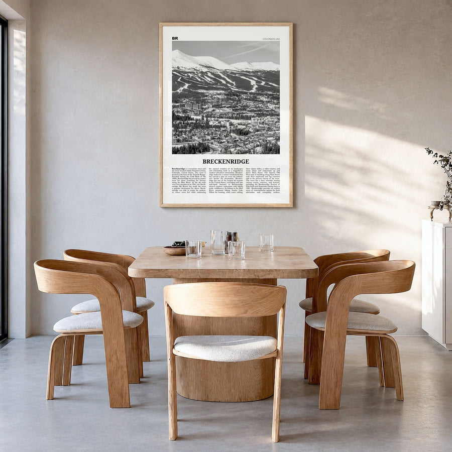 Breckenridge Newspaper Poster in a natural wood frame, hanging in a dining room
