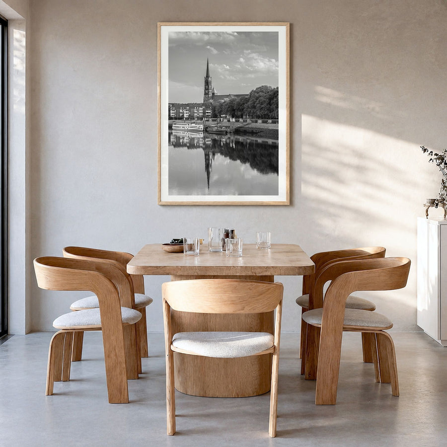Bremen Photo Poster in a natural wood frame, hanging in a dining room, white border