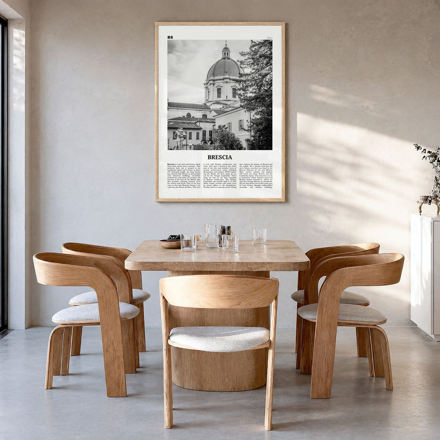 Brescia Newspaper Poster in a natural wood frame, hanging in a dining room