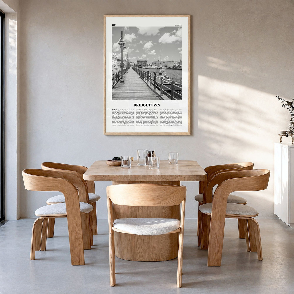 Bridgetown Newspaper Poster in a natural wood frame, hanging in a dining room