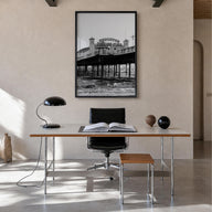 Brighton black & white photo poster of England, UK – vertical wall art in black wood frame, hanging on wall