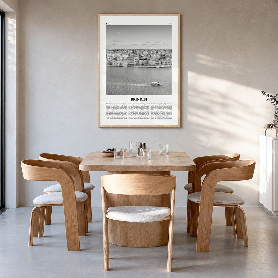 Brindisi Newspaper Poster in a natural wood frame, hanging in a dining room