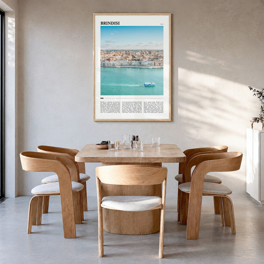 Brindisi Travel Poster in a natural wood frame, hanging in a dining room