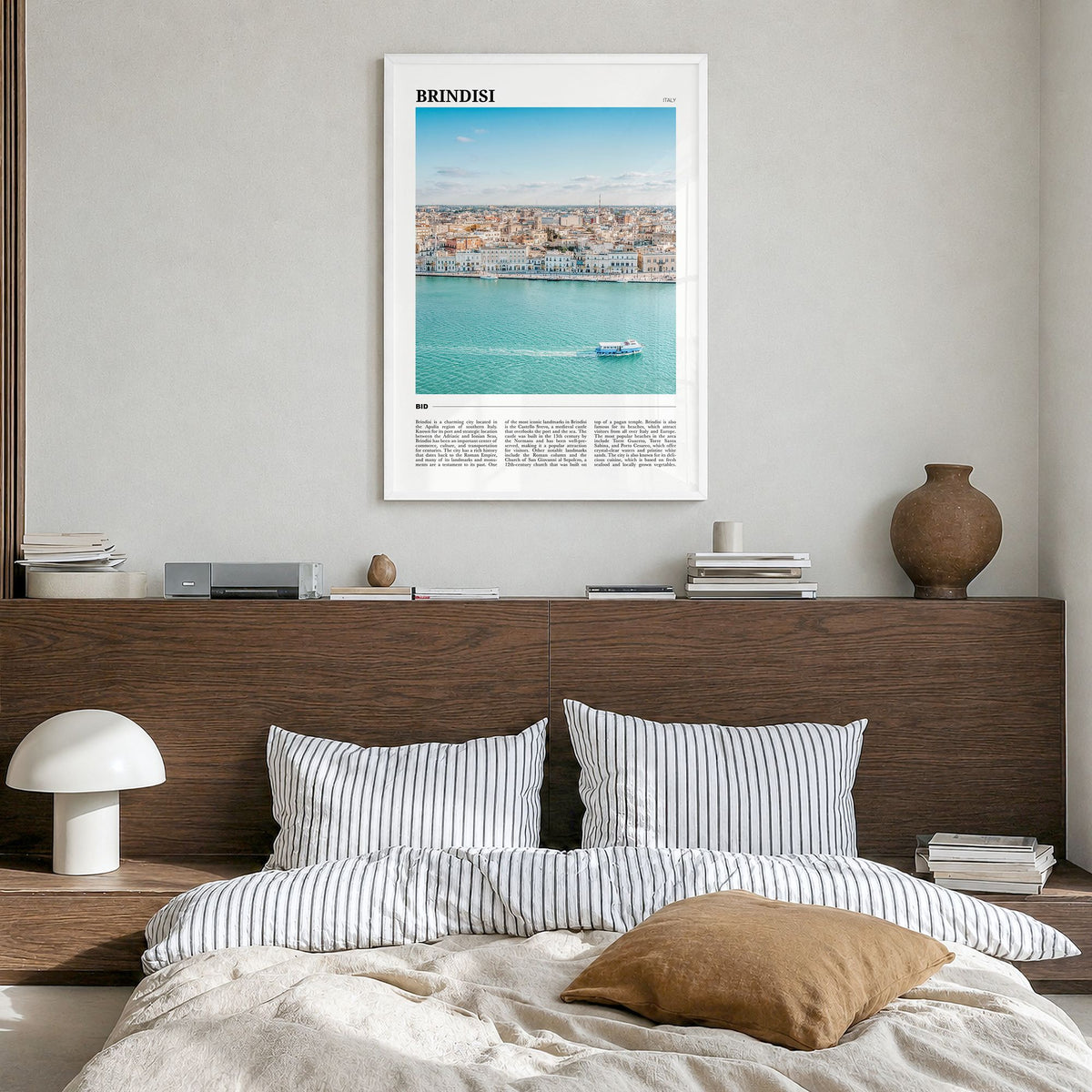 Brindisi Travel Poster in a white wood frame, hanging in a bedroom
