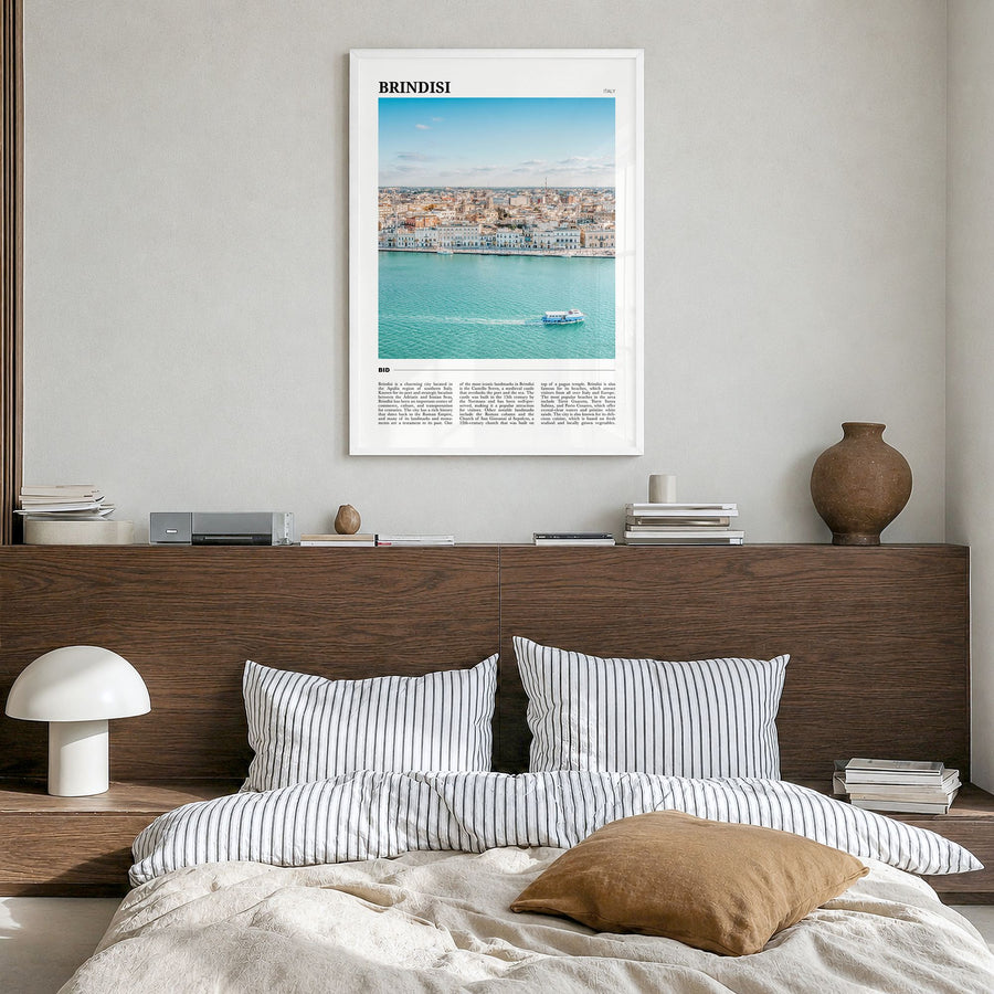 Brindisi Travel Poster in a white wood frame, hanging in a bedroom