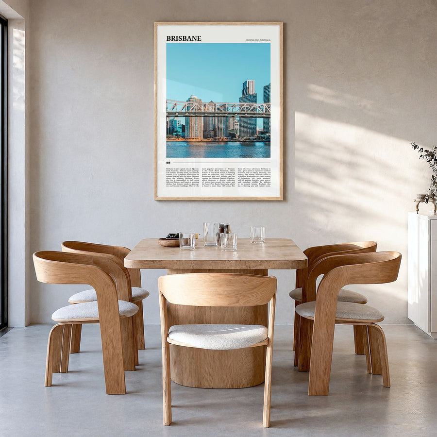 Brisbane Travel Poster in a natural wood frame, hanging in a dining room