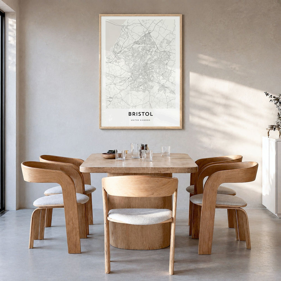 Bristol Map Poster in a natural wood frame, hanging in a dining room