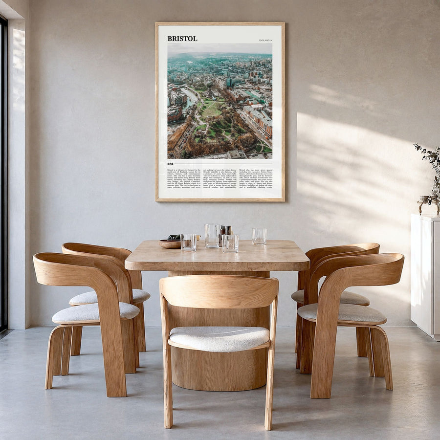 Bristol Travel Poster in a natural wood frame, hanging in a dining room