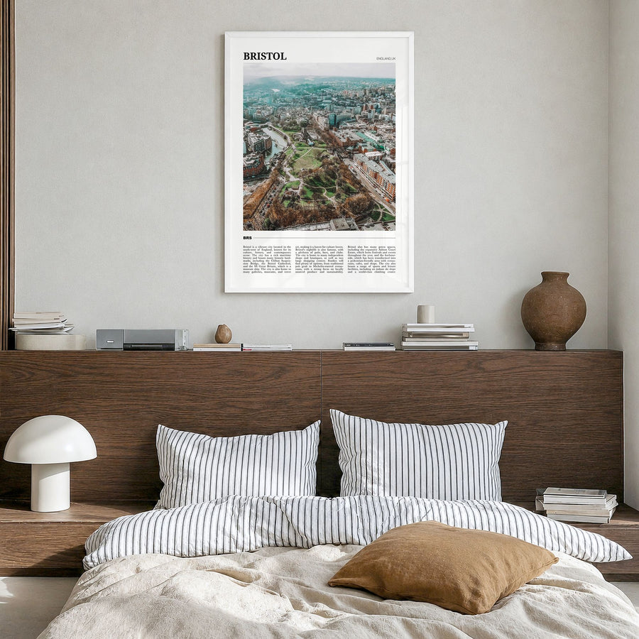 Bristol Travel Poster in a white wood frame, hanging in a bedroom