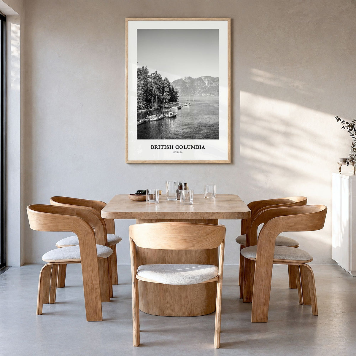 British Columbia Classic Poster in a natural wood frame, hanging in a dining room