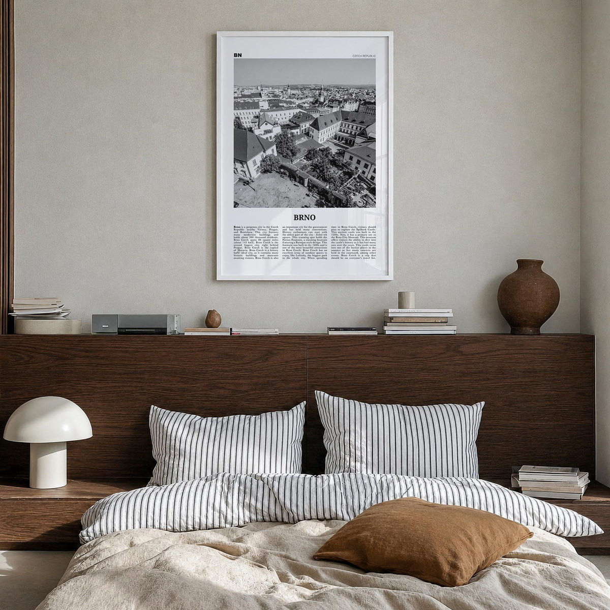 Brno black & white newspaper poster of Czechia – vertical wall art in white wood frame, hanging on wall