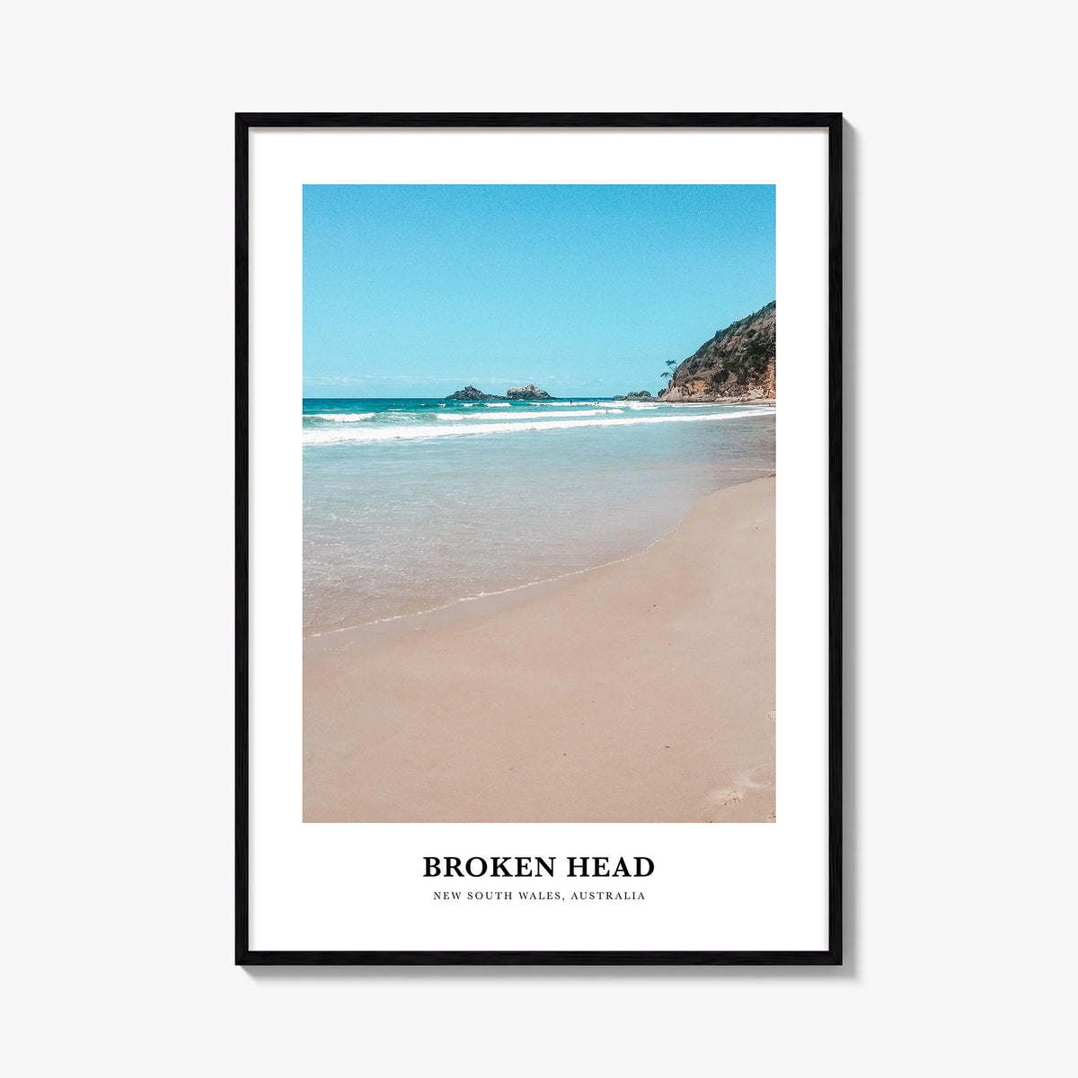 Broken Head colorful classic poster of Australia – vertical wall art, unframed print shown in interior mockup