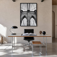 Brooklyn Bridge black & white photo poster of New York City, New York – vertical wall art in black wood frame, hanging on wal