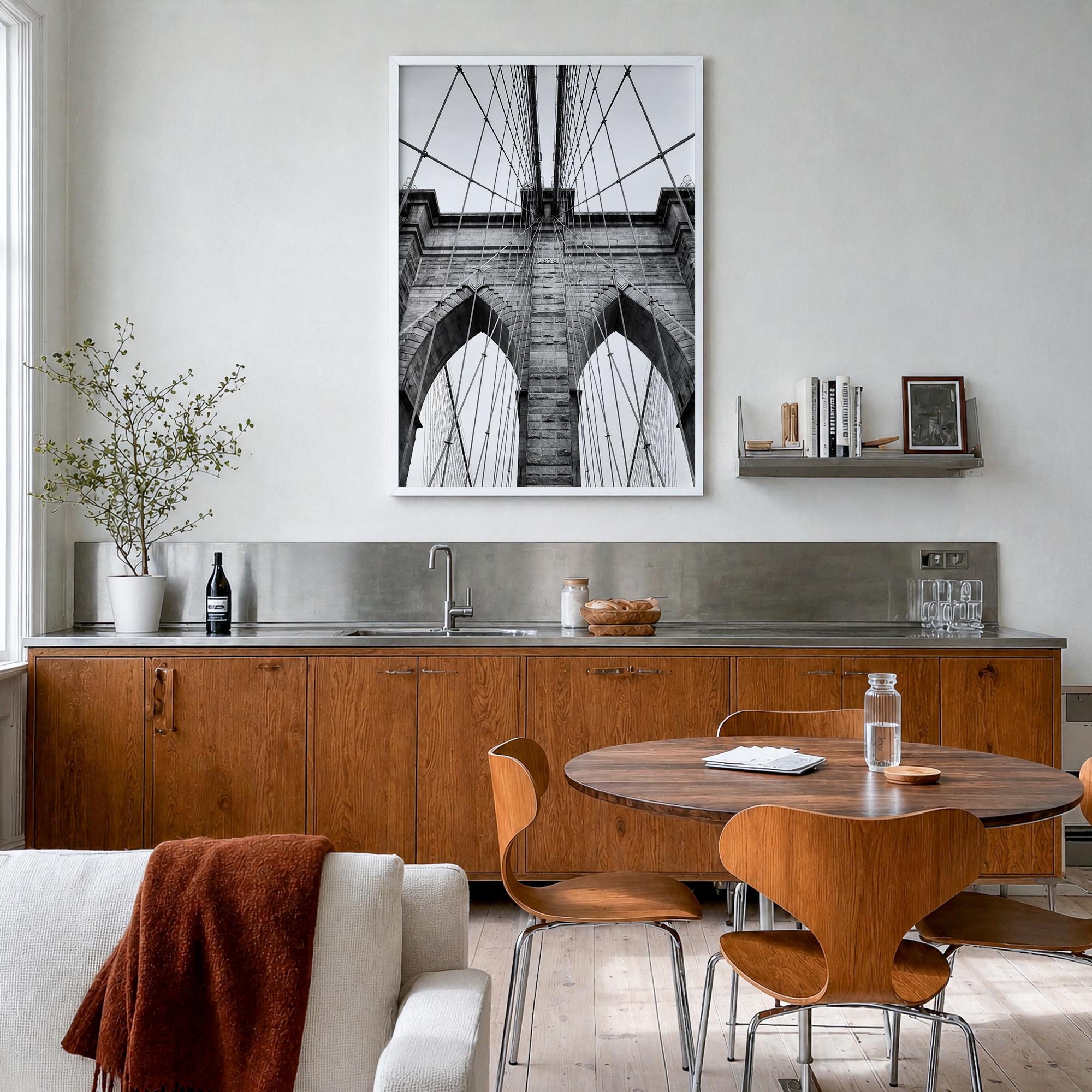 Brooklyn Bridge black & white photo poster of New York City, New York – vertical wall art in white wood frame, hanging on wal