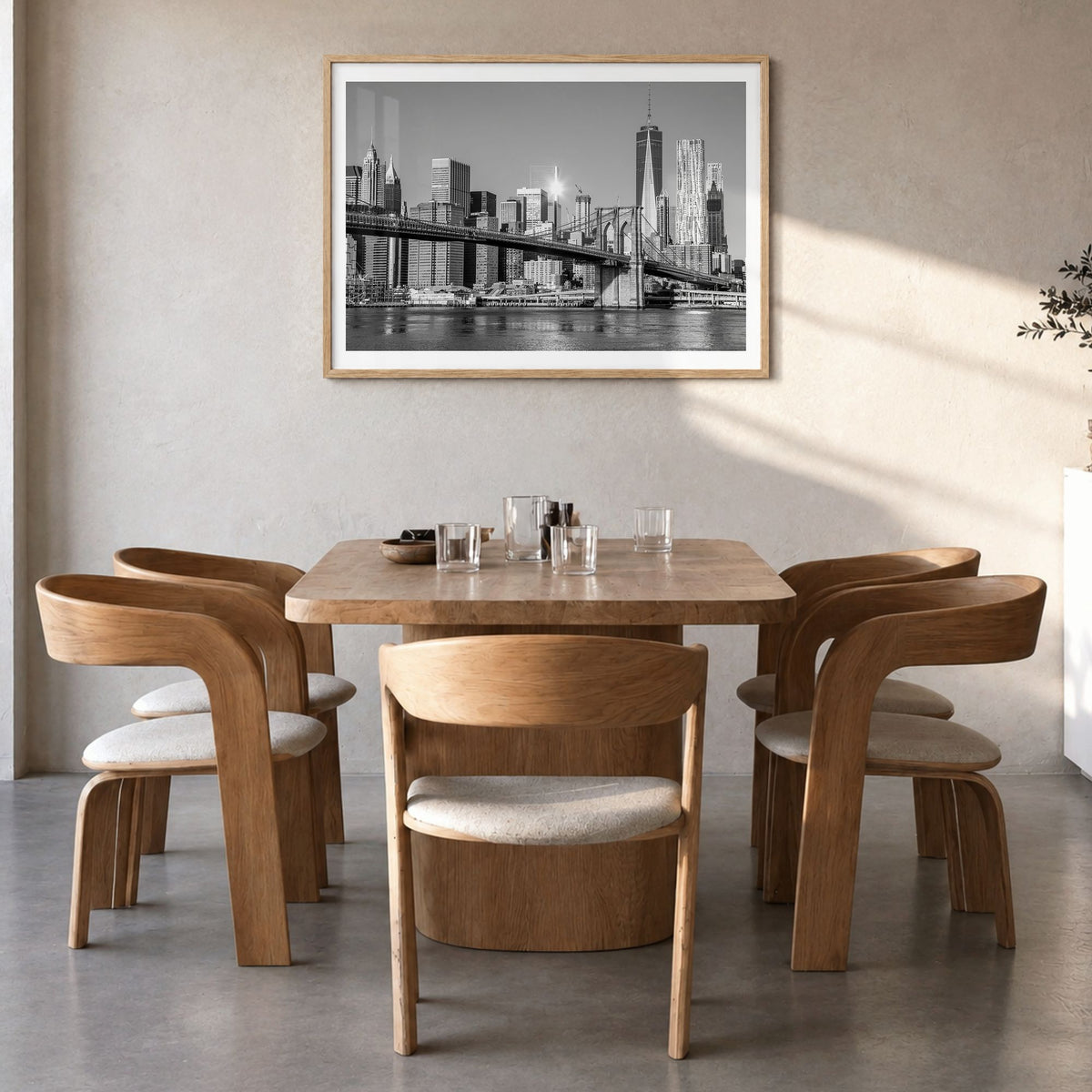 Brooklyn Photo Poster in a natural wood frame, hanging in a dining room, white border