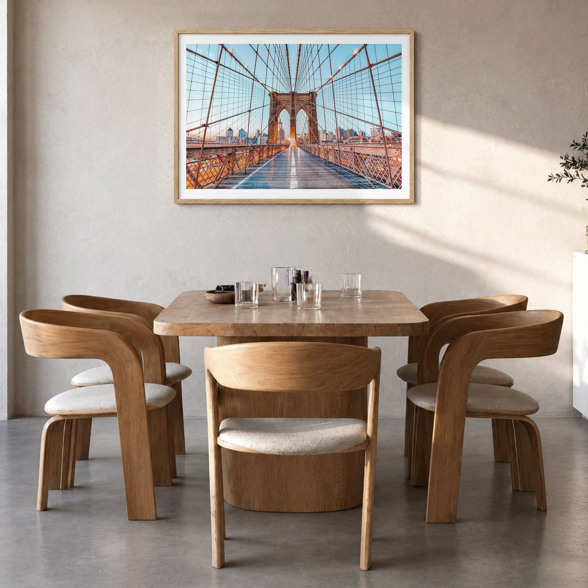Brooklyn Photo Poster in a natural wood frame, hanging in a dining room, white border