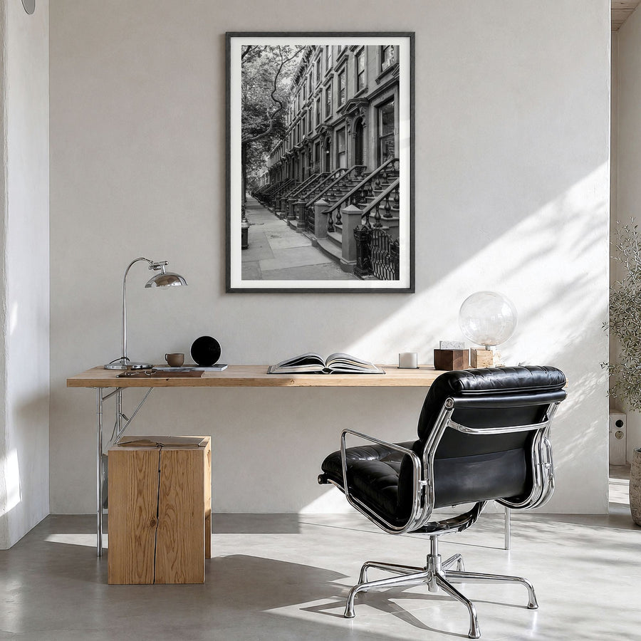 Brooklyn Photo No 2 Poster in a black wood frame, hanging in a bright home office, white border