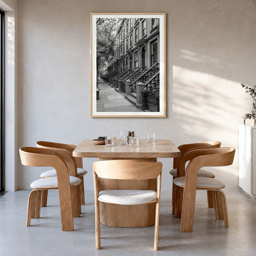 Brooklyn Photo No 2 Poster in a natural wood frame, hanging in a dining room, white border