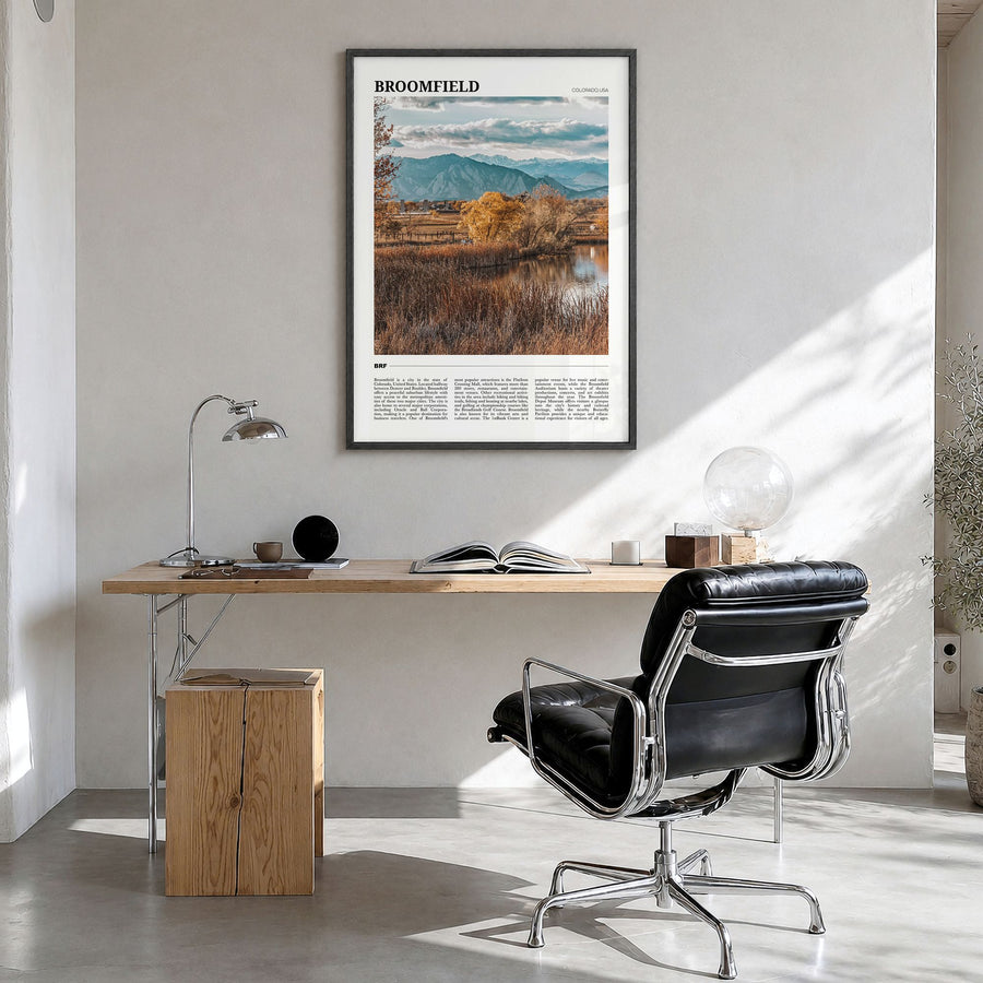 Broomfield Travel Poster in a black wood frame, hanging in a bright home office