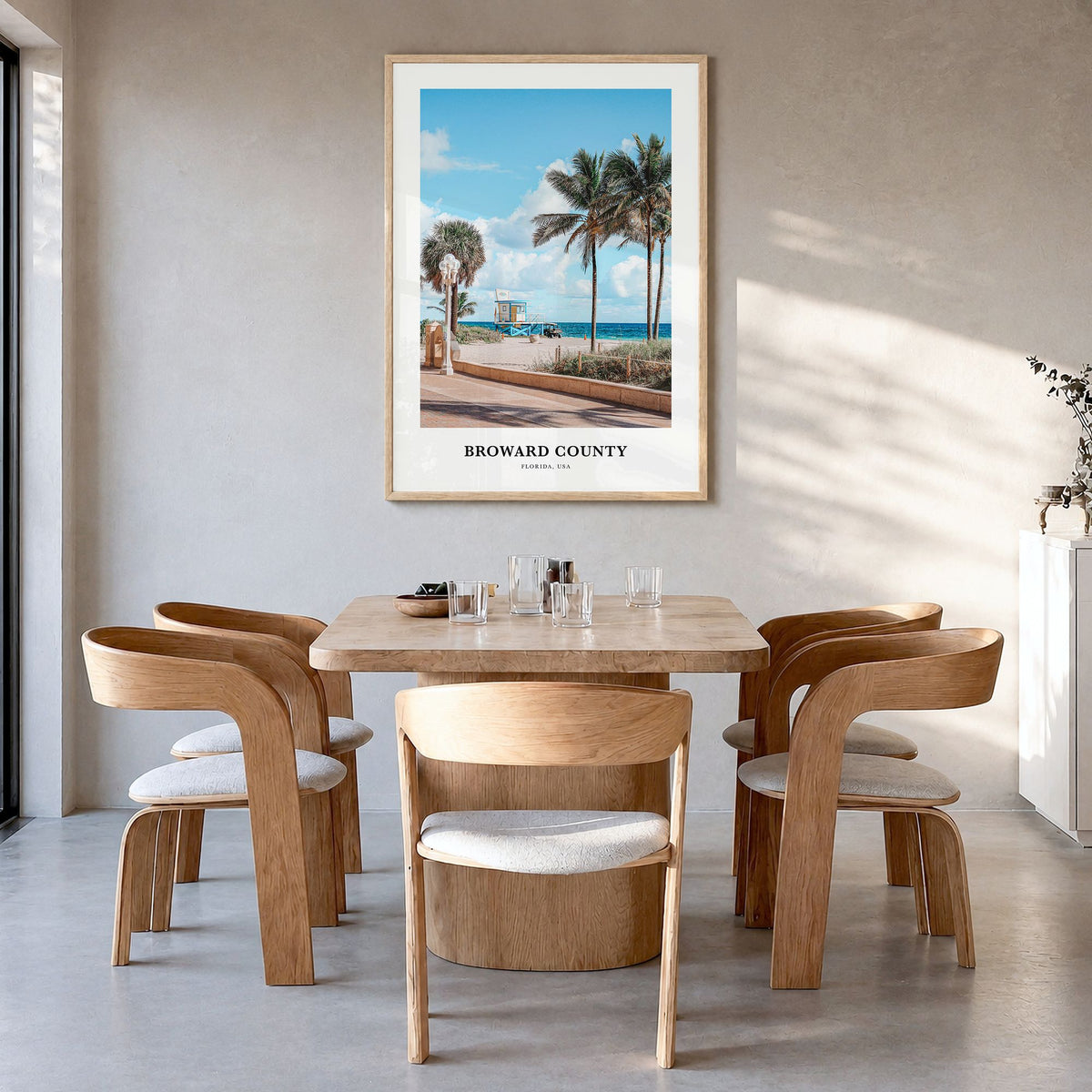 Broward County Classic Poster in a natural wood frame, hanging in a dining room