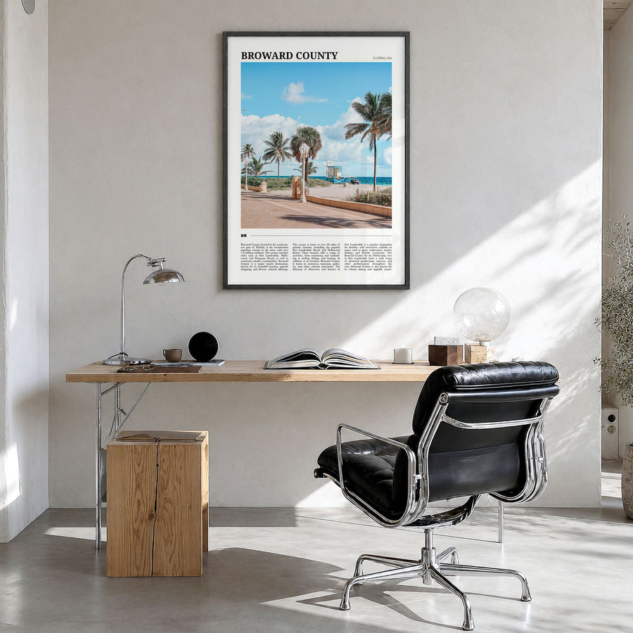 Broward County Travel Poster in a black wood frame, hanging in a bright home office