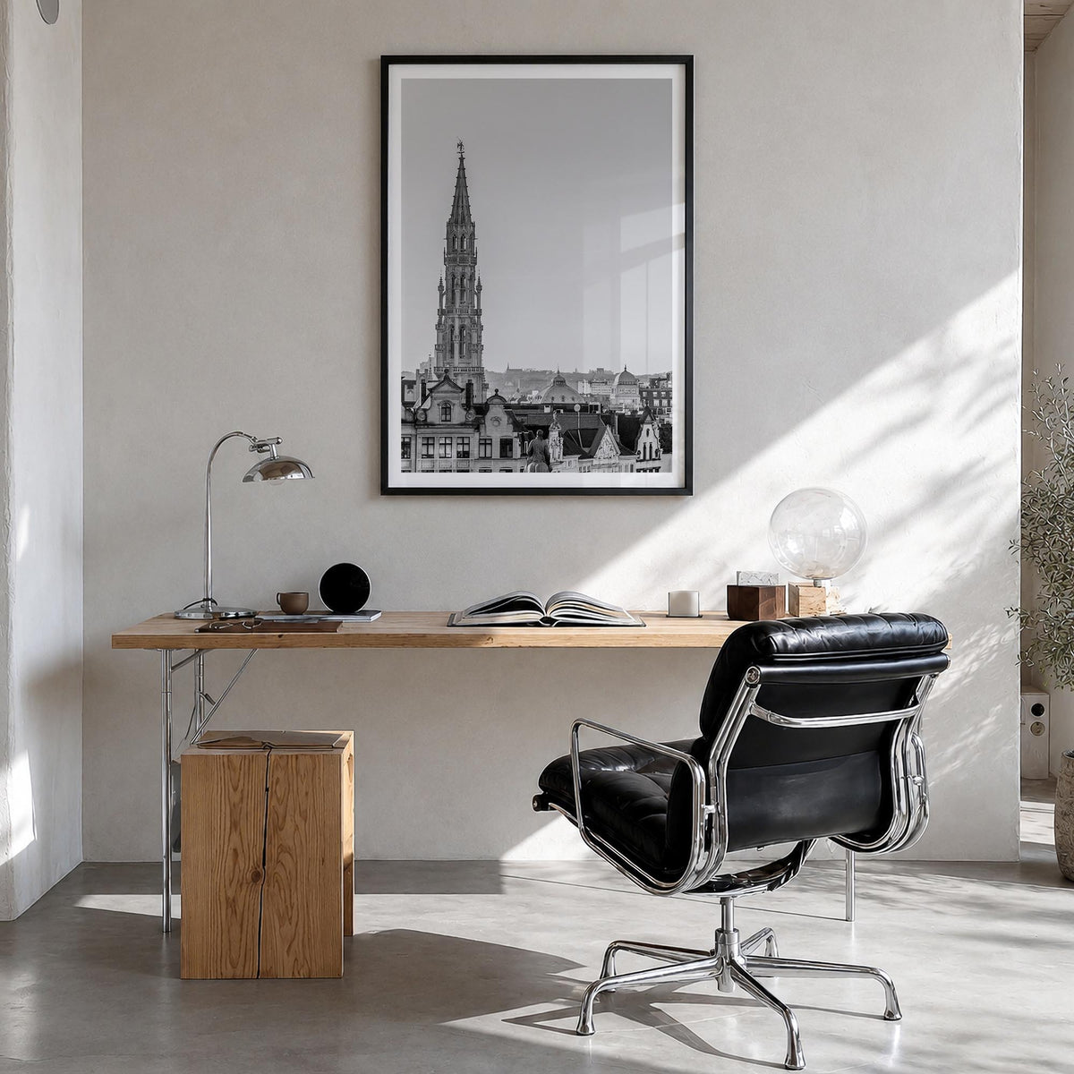 Brussels black & white photo poster of Belgium – vertical wall art in black wood frame with white border, hanging on wall