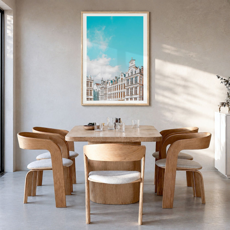 Brussels Photo No 2 Poster in a natural wood frame, hanging in a dining room, white border