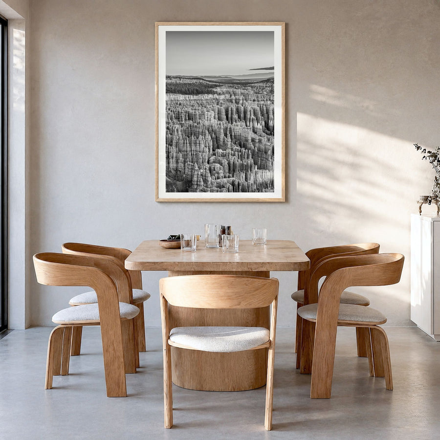 Bryce Canyon National Park Photo Poster in a natural wood frame, hanging in a dining room, white border