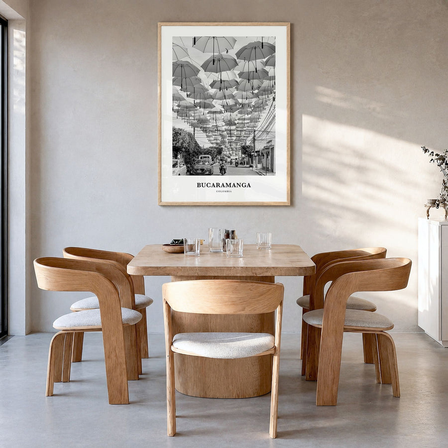 Bucaramanga Classic Poster in a natural wood frame, hanging in a dining room