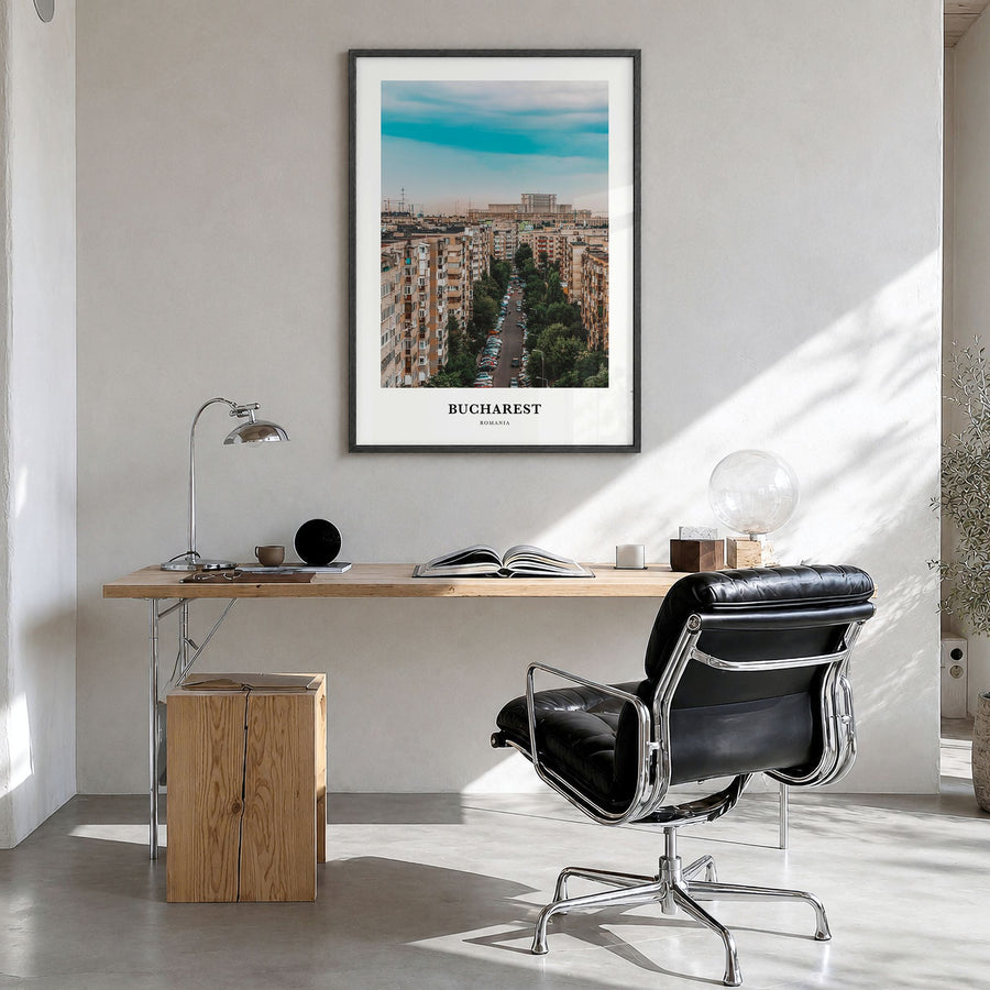 Bucharest Classic No 1 Poster in a black wood frame, hanging in a bright home office