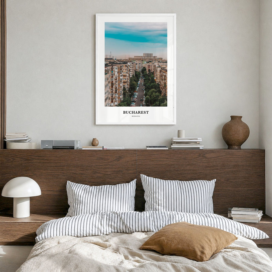 Bucharest Classic No 1 Poster in a white wood frame, hanging in a bedroom