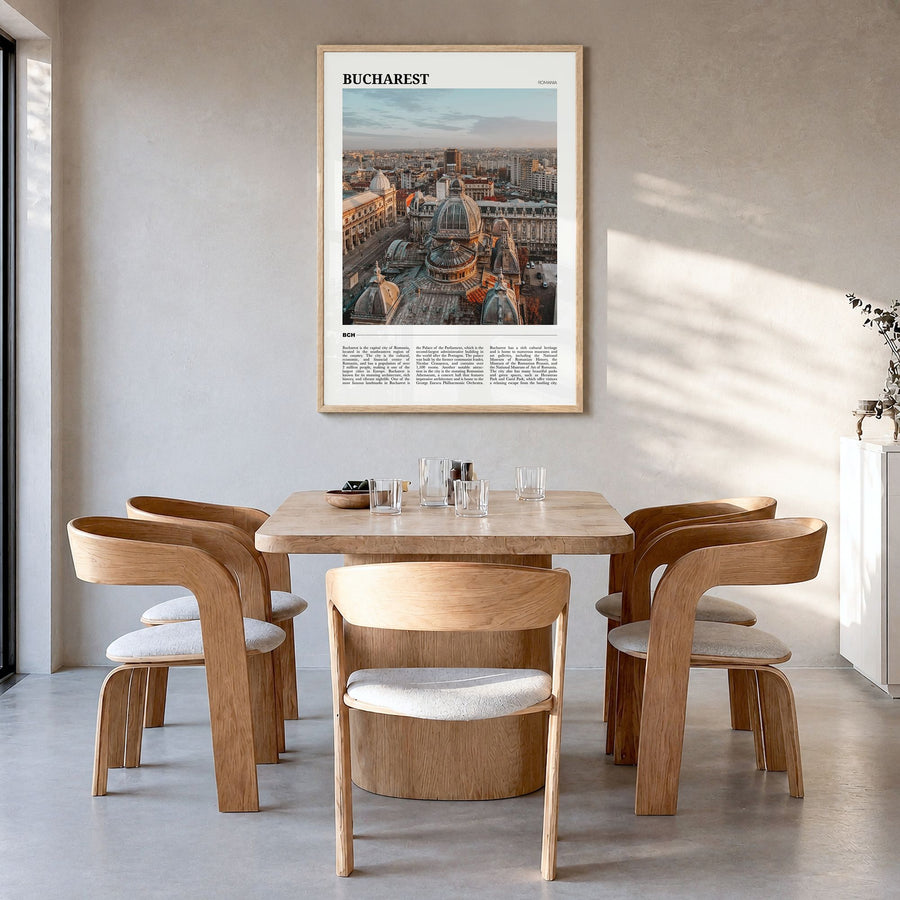 Bucharest Travel No 2 Poster in a natural wood frame, hanging in a dining room