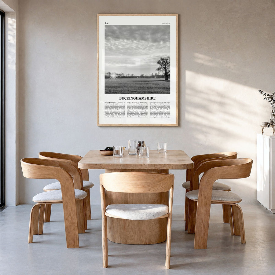 Buckinghamshire Newspaper Poster in a natural wood frame, hanging in a dining room