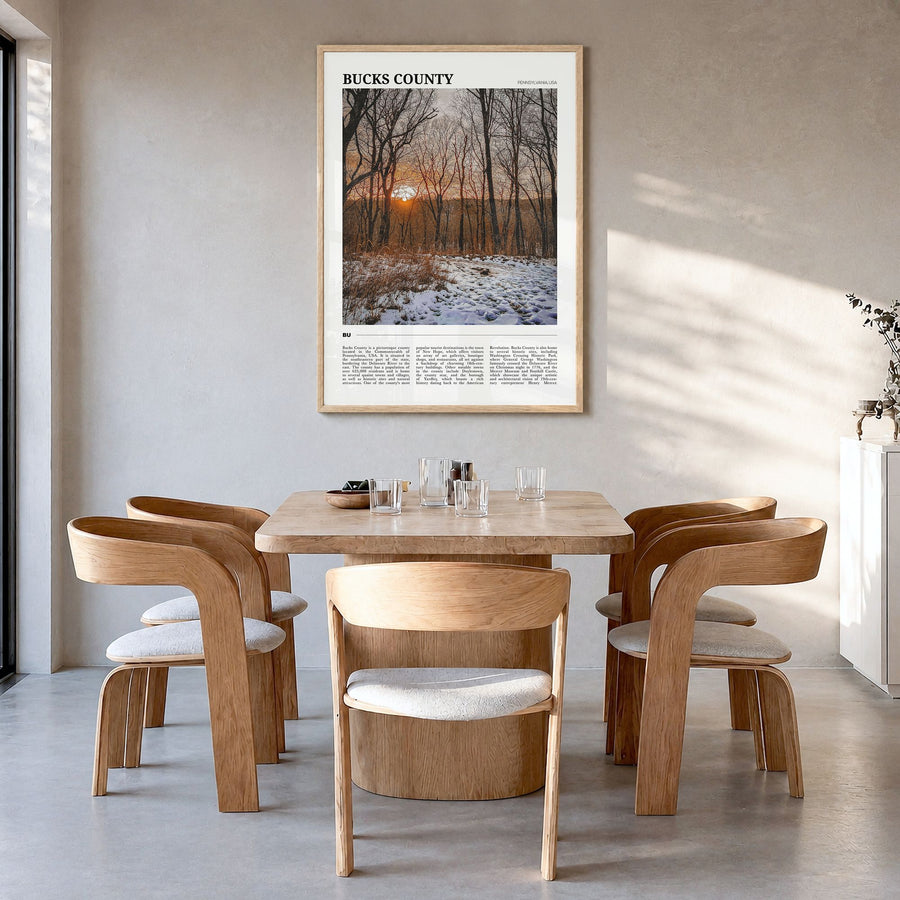 Bucks County Travel Poster in a natural wood frame, hanging in a dining room