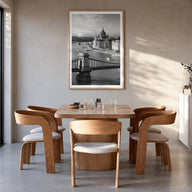 Budapest black & white photo poster of Hungary – vertical wall art in natural wood frame with white border, hanging on wall