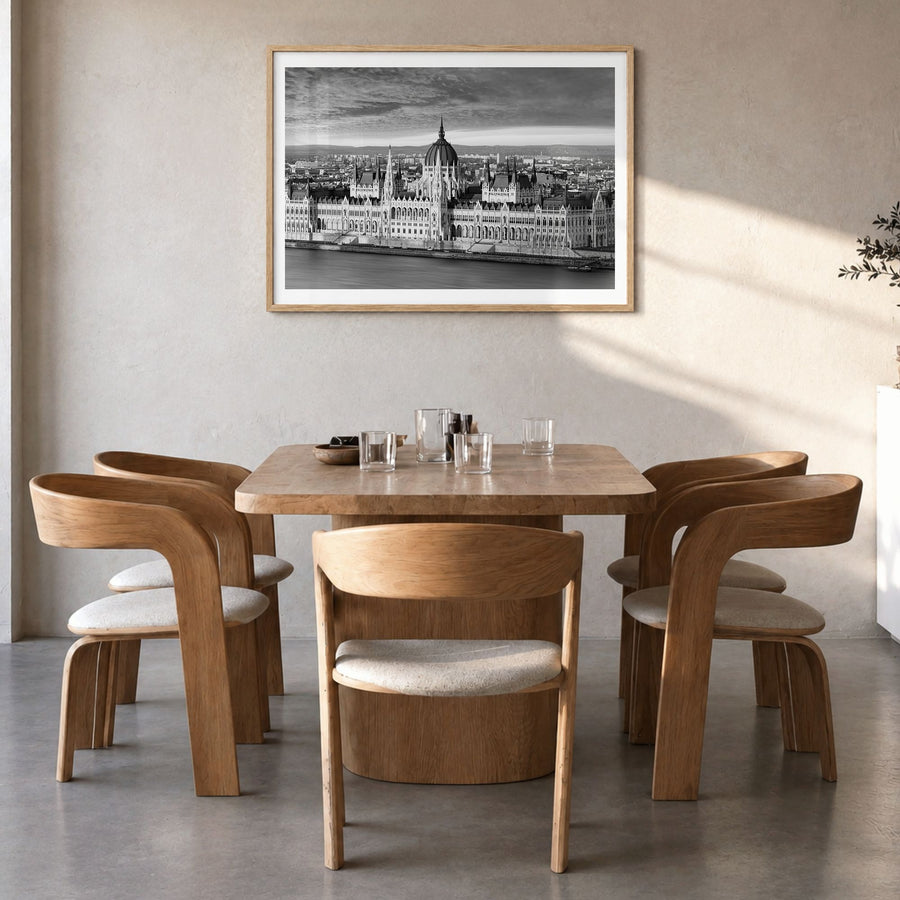 Budapest Photo Poster in a natural wood frame, hanging in a dining room, white border