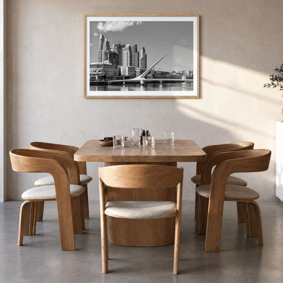 Buenos Aires Photo Poster in a natural wood frame, hanging in a dining room, white border