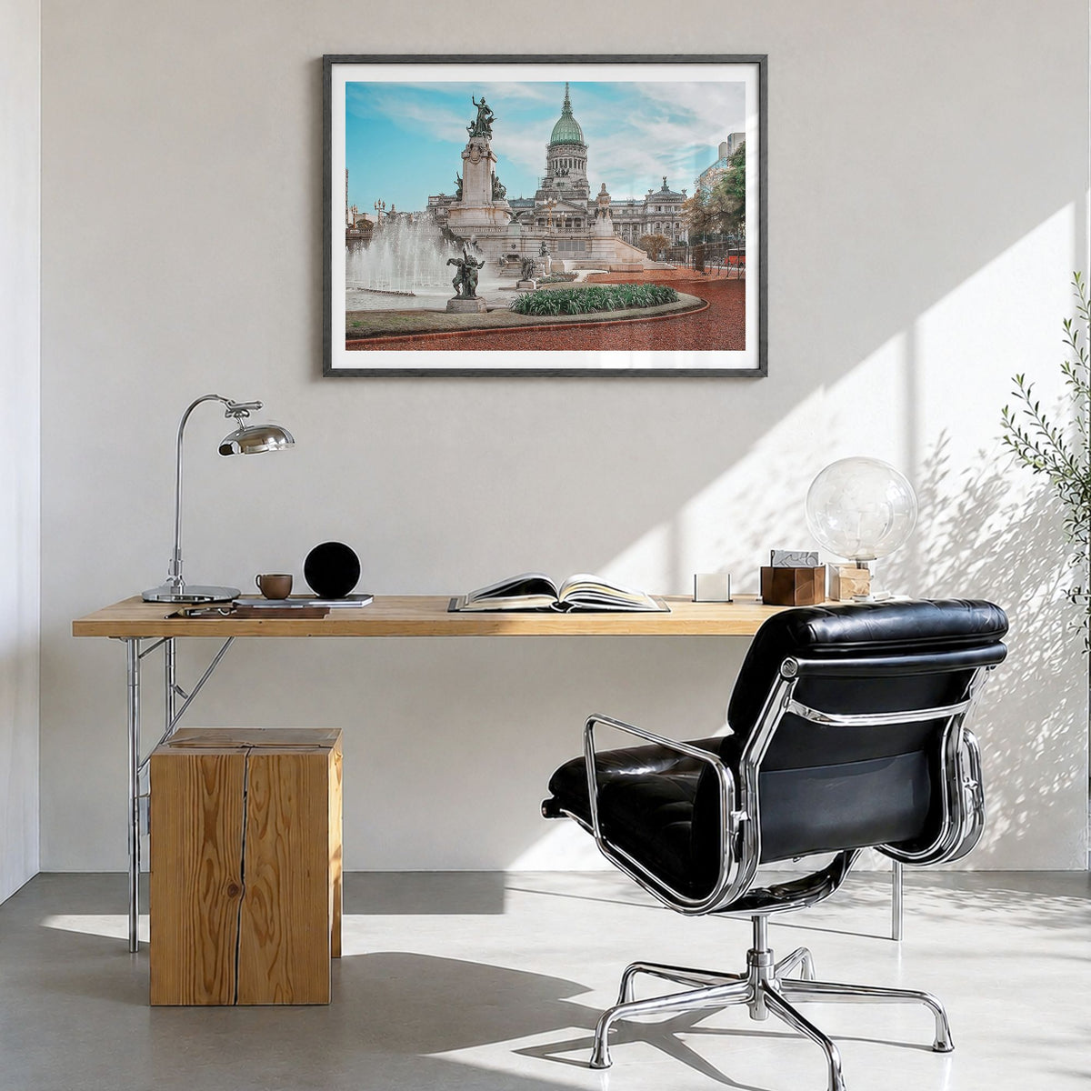 Buenos Aires Photo Poster in a black wood frame, hanging in a bright home office, white border
