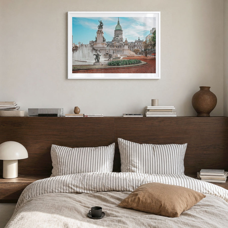 Buenos Aires Photo Poster in a white wood frame, hanging in a bedroom, white border
