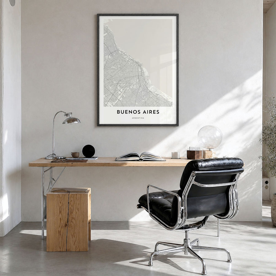 Buenos Aires Map Poster in a black wood frame, hanging in a bright home office