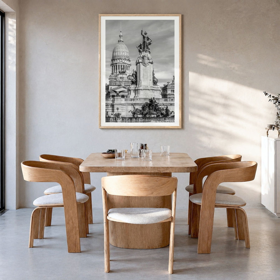 Buenos Aires Photo No 1 Poster in a natural wood frame, hanging in a dining room, white border
