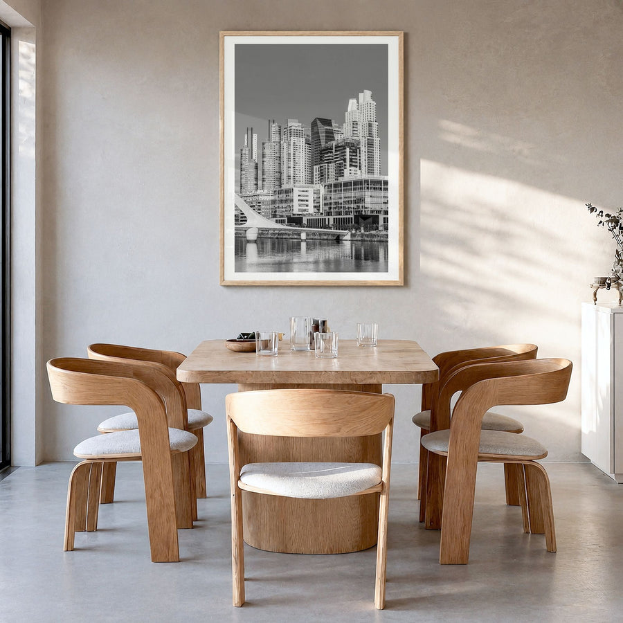 Buenos Aires Photo No 2 Poster in a natural wood frame, hanging in a dining room, white border
