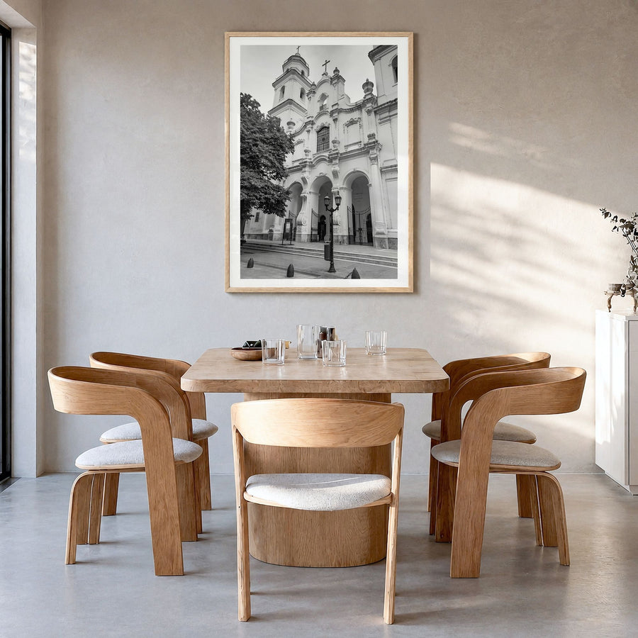 Buenos Aires Photo No 3 Poster in a natural wood frame, hanging in a dining room, white border